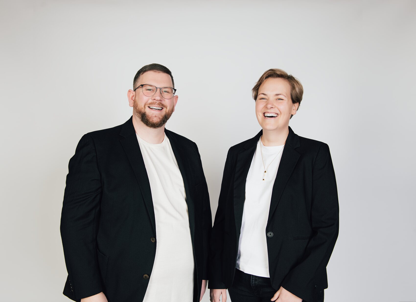 Charly und Michael, Gründer von Qonroom